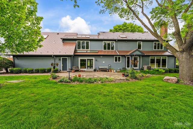 11 N Meadow Ct, South Barrington, IL 60010 - back of property with a patio, a chimney, and a lawn