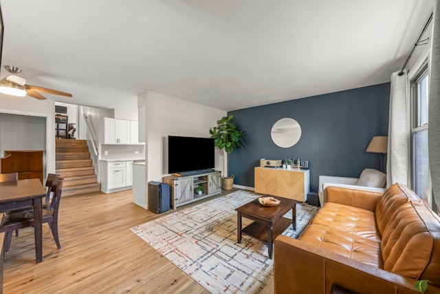 559 Coolidge Ave, Glen Ellyn, IL 60137 - living area with light wood finished floors, stairs, and ceiling fan