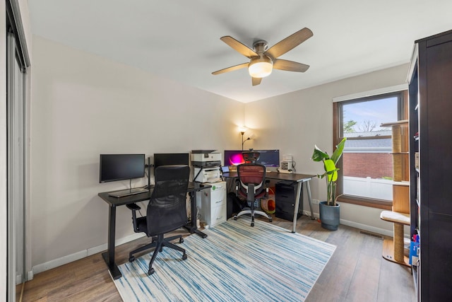 559 Coolidge Ave, Glen Ellyn, IL 60137 - office space featuring wood finished floors, a ceiling fan, and baseboards