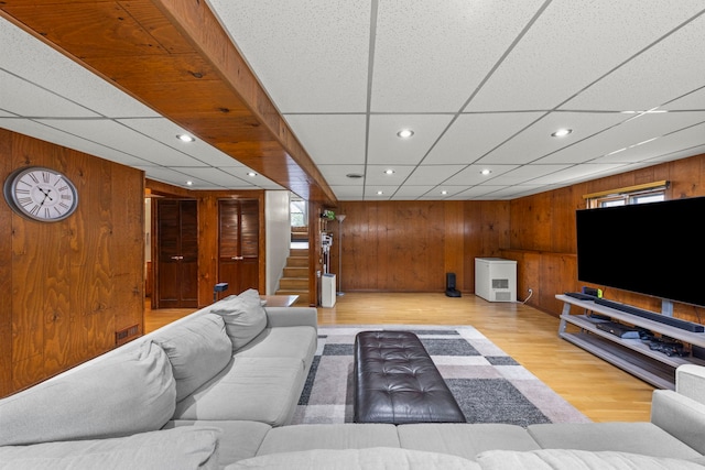 559 Coolidge Ave, Glen Ellyn, IL 60137 - living area featuring wooden walls, stairway, wood finished floors, recessed lighting, and a paneled ceiling