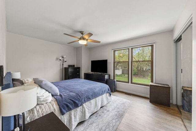 559 Coolidge Ave, Glen Ellyn, IL 60137 - bedroom featuring light wood finished floors, a ceiling fan, and baseboards