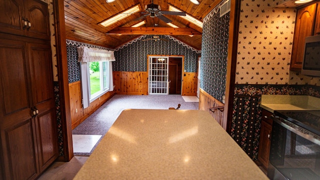 214 W Watson St, Forrest, IL 61741 - wine cellar with wainscoting, vaulted ceiling, ceiling fan, wallpapered walls, and wooden ceiling