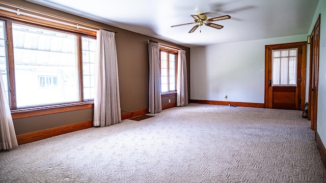 214 W Watson St, Forrest, IL 61741 - spare room with carpet, ceiling fan, and baseboards