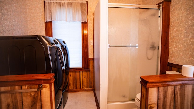 214 W Watson St, Forrest, IL 61741 - full bath featuring wainscoting, wallpapered walls, a stall shower, toilet, and washer and clothes dryer
