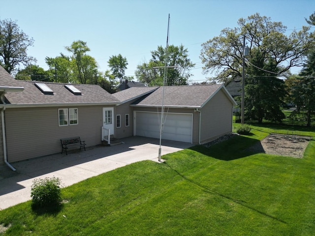 214 W Watson St, Forrest, IL 61741 - view of front of house featuring a garage, a front lawn, entry steps, driveway, and roof with shingles