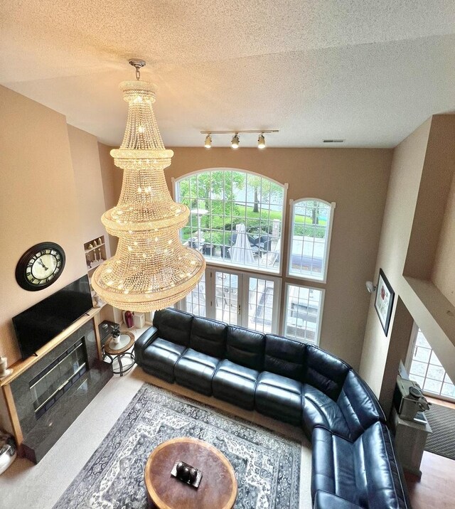 dining room with a chandelier, light wood-style floors, and baseboards