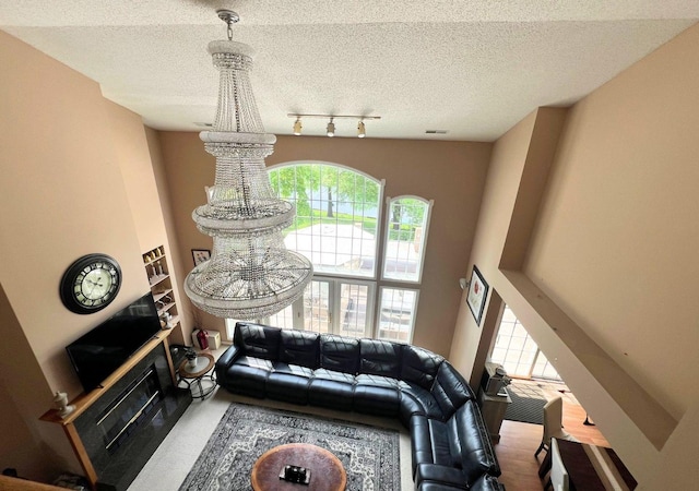 living room with a textured ceiling