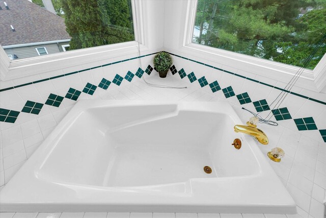 bathroom featuring a garden tub