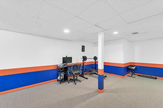 office space with carpet flooring, a paneled ceiling, baseboards, and recessed lighting