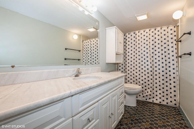 bathroom with vanity, toilet, and a shower with shower curtain