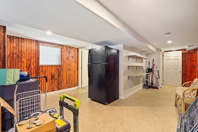 3668 Adams St, Lansing, IL 60438 - below grade area featuring freestanding refrigerator, baseboards, and wooden walls