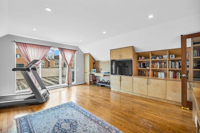 workout room with light wood-style floors, lofted ceiling, and recessed lighting