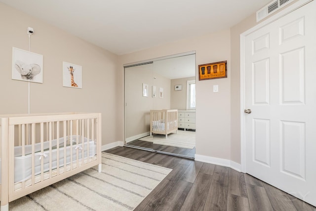 11102 S 84th Ave Unit 2B, Palos Hills, IL 60465 - bedroom with wood finished floors, baseboards, and a closet