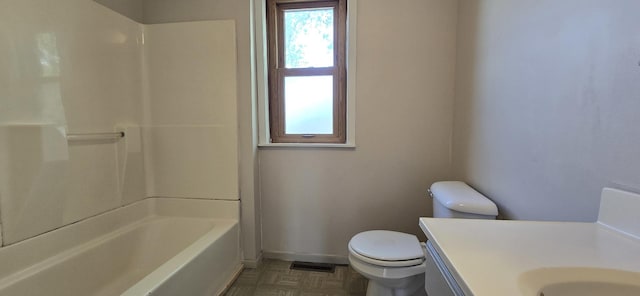 bathroom with toilet, bathing tub / shower combination, visible vents, baseboards, and vanity