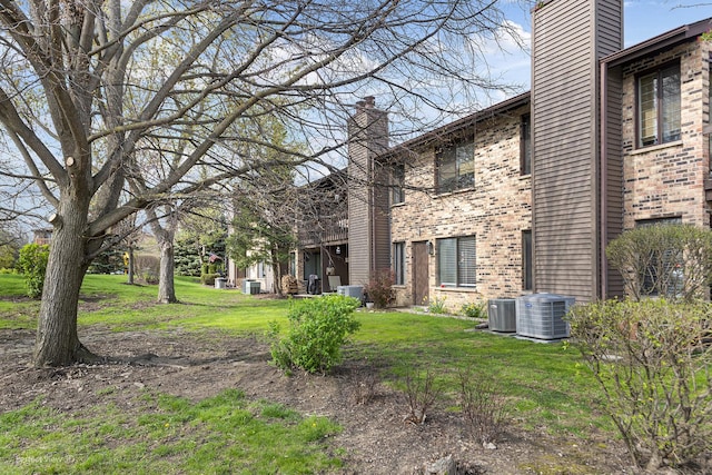 view of yard featuring central AC unit