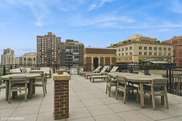 1255 N State Pkwy Unit 4G, Chicago, IL 60610 - view of patio / terrace featuring outdoor dining space and a city view