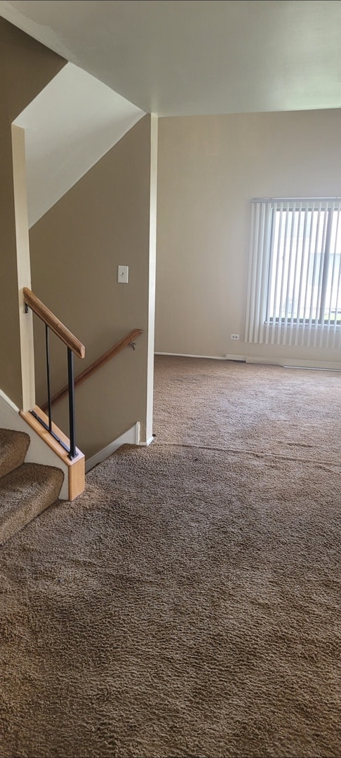 interior space featuring baseboards