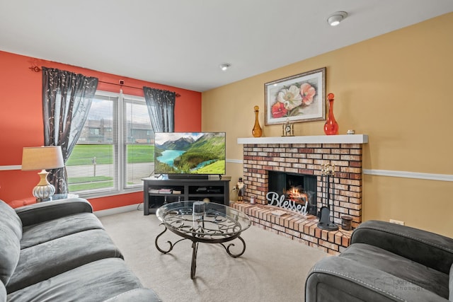 living area featuring carpet and a brick fireplace