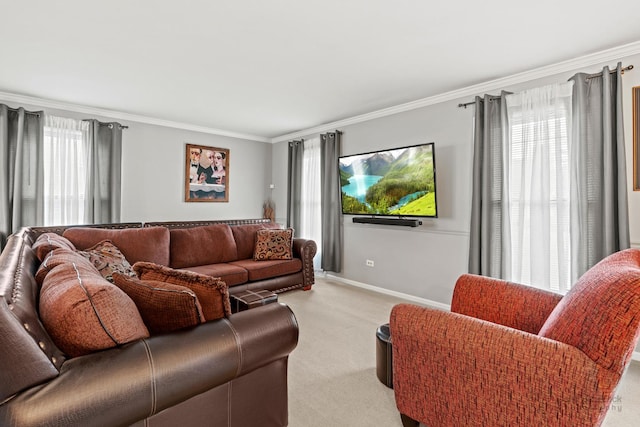 living area featuring light carpet, crown molding, and baseboards