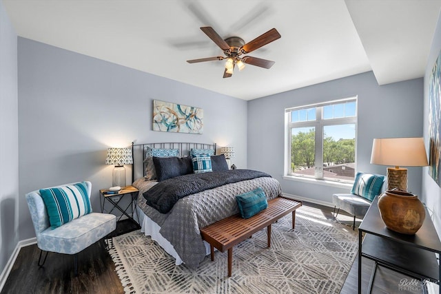 235 N Smith St Unit 509, Palatine, IL 60067 - bedroom featuring baseboards, wood finished floors, and a ceiling fan