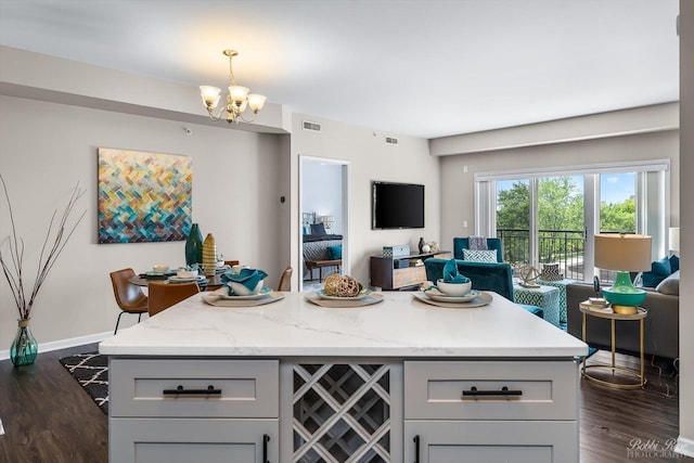 235 N Smith St Unit 509, Palatine, IL 60067 - kitchen featuring open floor plan, gray cabinets, dark wood-style floors, and a chandelier