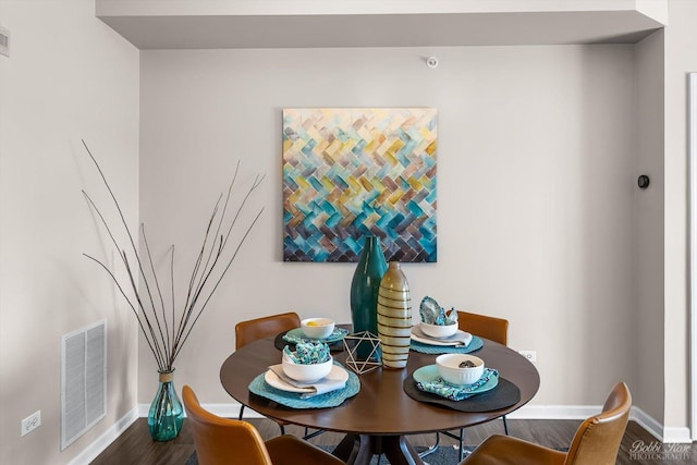 235 N Smith St Unit 509, Palatine, IL 60067 - dining space with baseboards and wood finished floors