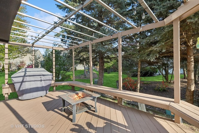 unfurnished sunroom featuring an outdoor fire pit
