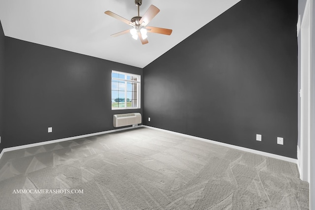 unfurnished room featuring baseboards, a wall mounted air conditioner, ceiling fan, and carpet