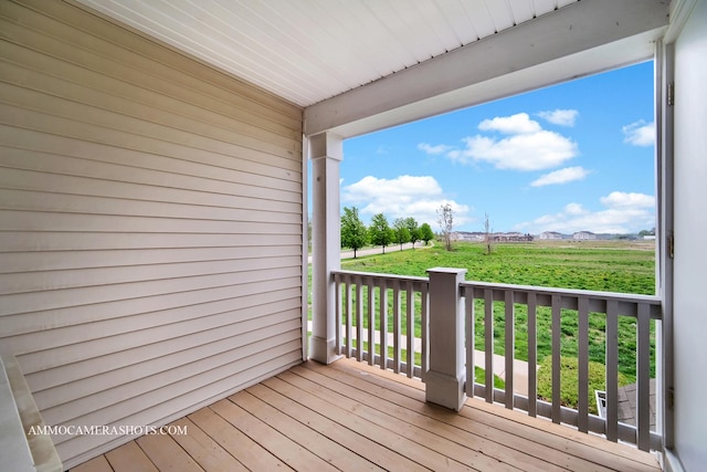wooden terrace with a mountain view