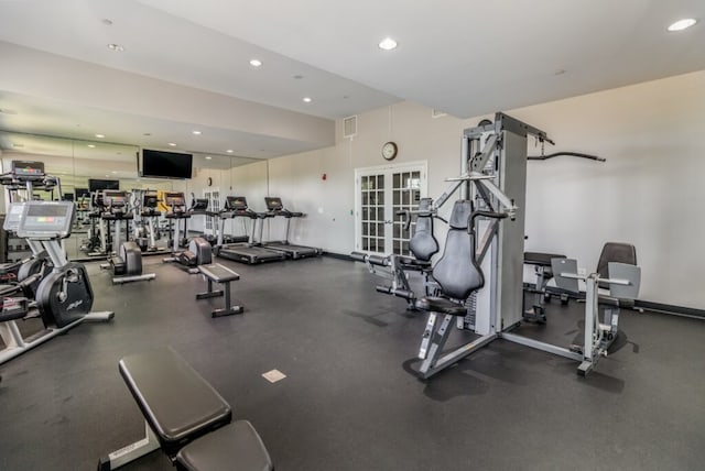 exercise room featuring visible vents, french doors, and recessed lighting