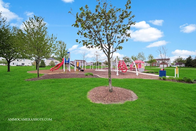 communal playground with a lawn
