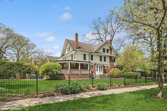 view of front of home featuring a chimney, stucco siding, and a shingled roof