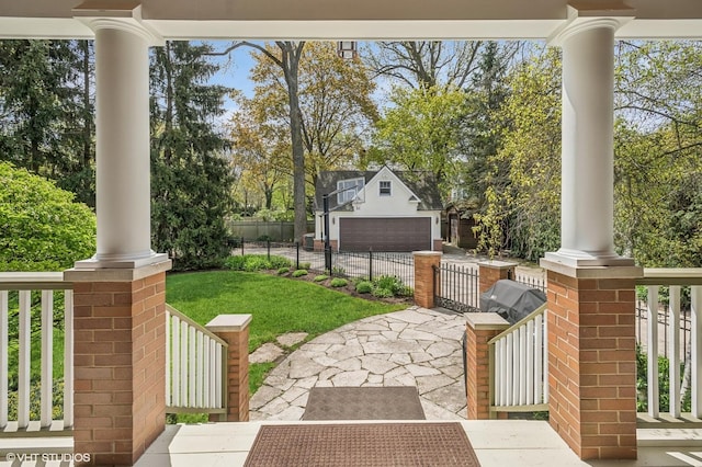 view of yard with covered porch