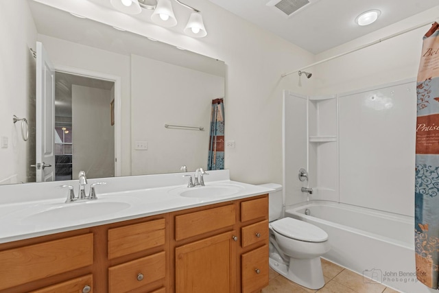 full bathroom with double vanity, shower / bath combo, a sink, tile patterned floors, and visible vents