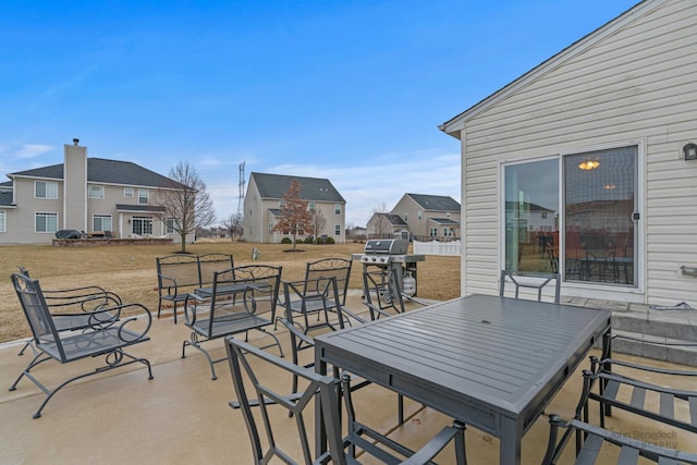 view of patio / terrace with outdoor dining area and a grill