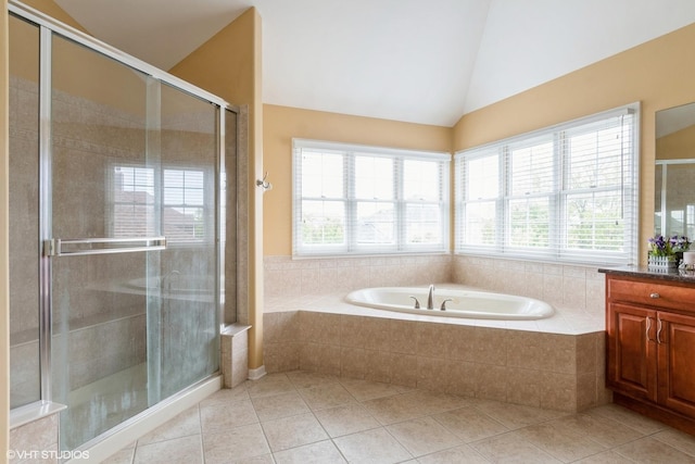 12116 Winterberry Ln, Plainfield, IL 60585 - bathroom featuring vanity, vaulted ceiling, a garden tub, tile patterned flooring, and a shower stall