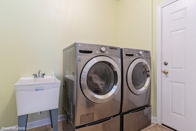 12116 Winterberry Ln, Plainfield, IL 60585 - laundry room with washer and dryer and baseboards
