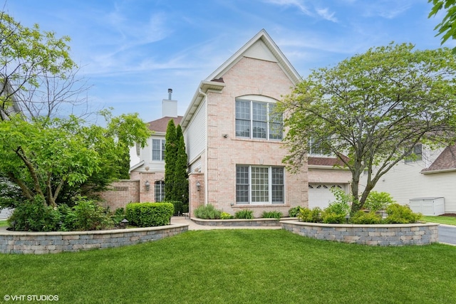 12116 Winterberry Ln, Plainfield, IL 60585 - traditional home with brick siding, a front lawn, and a garage