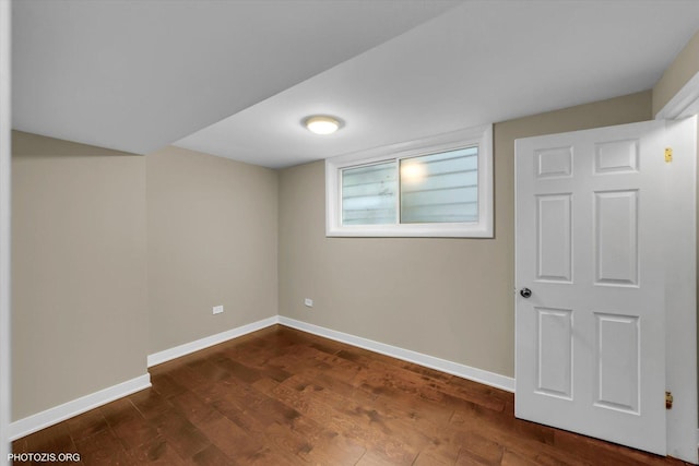 2432 W Ohio St, Chicago, IL 60612 - below grade area featuring baseboards and dark wood-style floors
