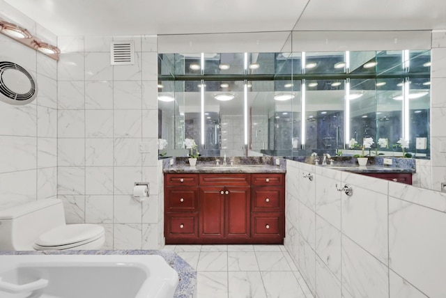 505 N Lake Shore Dr Unit 6304-6305, Chicago, IL 60611 - bathroom with toilet, tile walls, visible vents, marble finish floor, and vanity