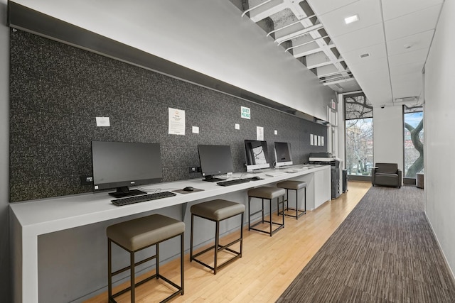 505 N Lake Shore Dr Unit 6304-6305, Chicago, IL 60611 - interior space with light wood-style flooring, a kitchen bar, and a high ceiling