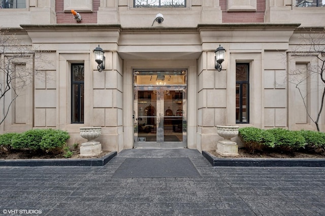1122 N Dearborn St Unit 10A, Chicago, IL 60610 - view of exterior entry featuring french doors and stone siding