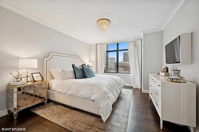 1122 N Dearborn St Unit 10A, Chicago, IL 60610 - bedroom with crown molding, dark wood-style flooring, and baseboards