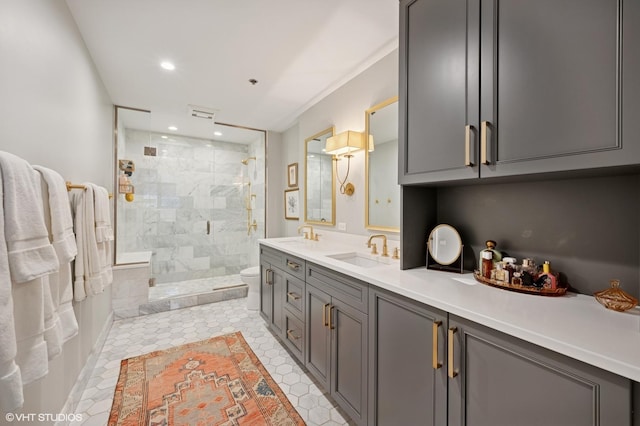 1122 N Dearborn St Unit 10A, Chicago, IL 60610 - full bath with a sink, double vanity, a shower stall, and recessed lighting