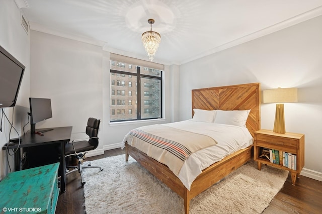 1122 N Dearborn St Unit 10A, Chicago, IL 60610 - bedroom featuring ornamental molding, a notable chandelier, baseboards, and wood finished floors