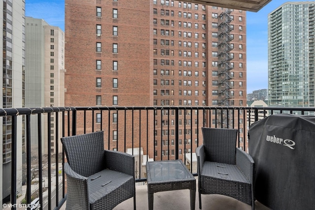 1122 N Dearborn St Unit 10A, Chicago, IL 60610 - balcony with a city view and area for grilling