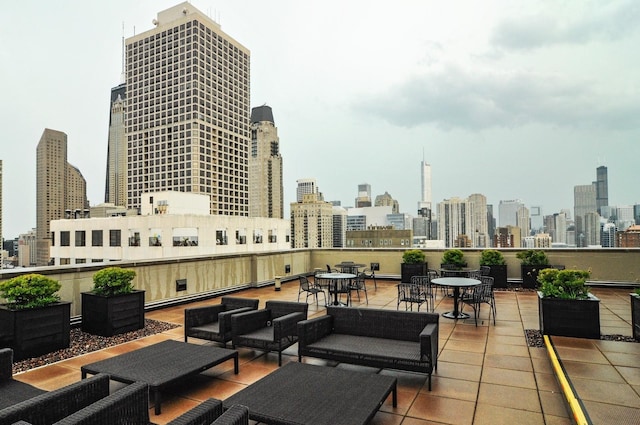 1122 N Dearborn St Unit 10A, Chicago, IL 60610 - view of patio with an outdoor hangout area and a view of city