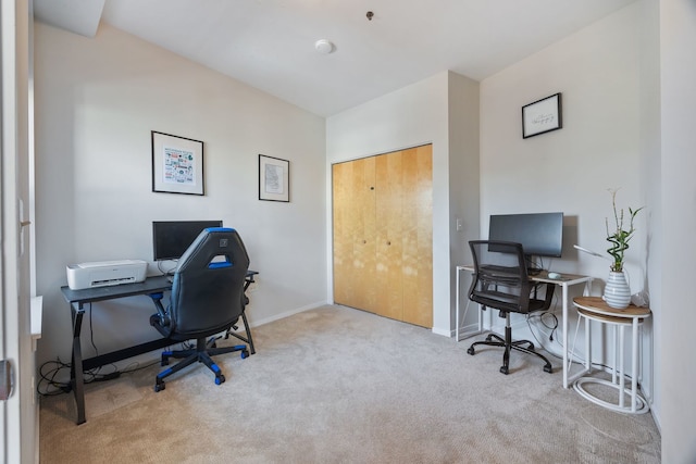 office with carpet flooring and baseboards