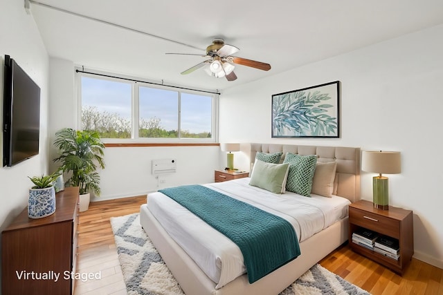 101 Bar Harbour Rd Unit 6N, Schaumburg, IL 60193 - bedroom featuring baseboards and light wood-style flooring