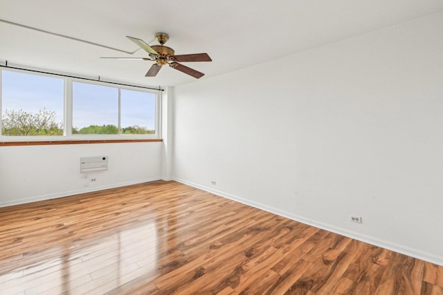 101 Bar Harbour Rd Unit 6N, Schaumburg, IL 60193 - empty room with wood finished floors, ceiling fan, and baseboards